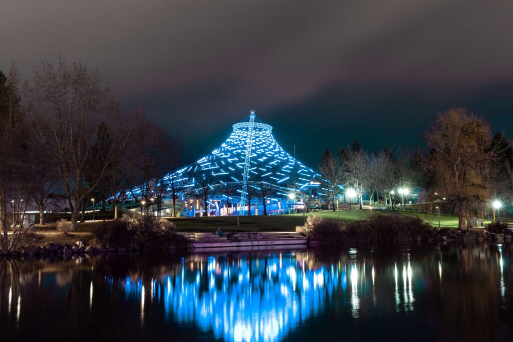 Spokane Riverfront Park Pavilion lit up at night for the Winter Market
